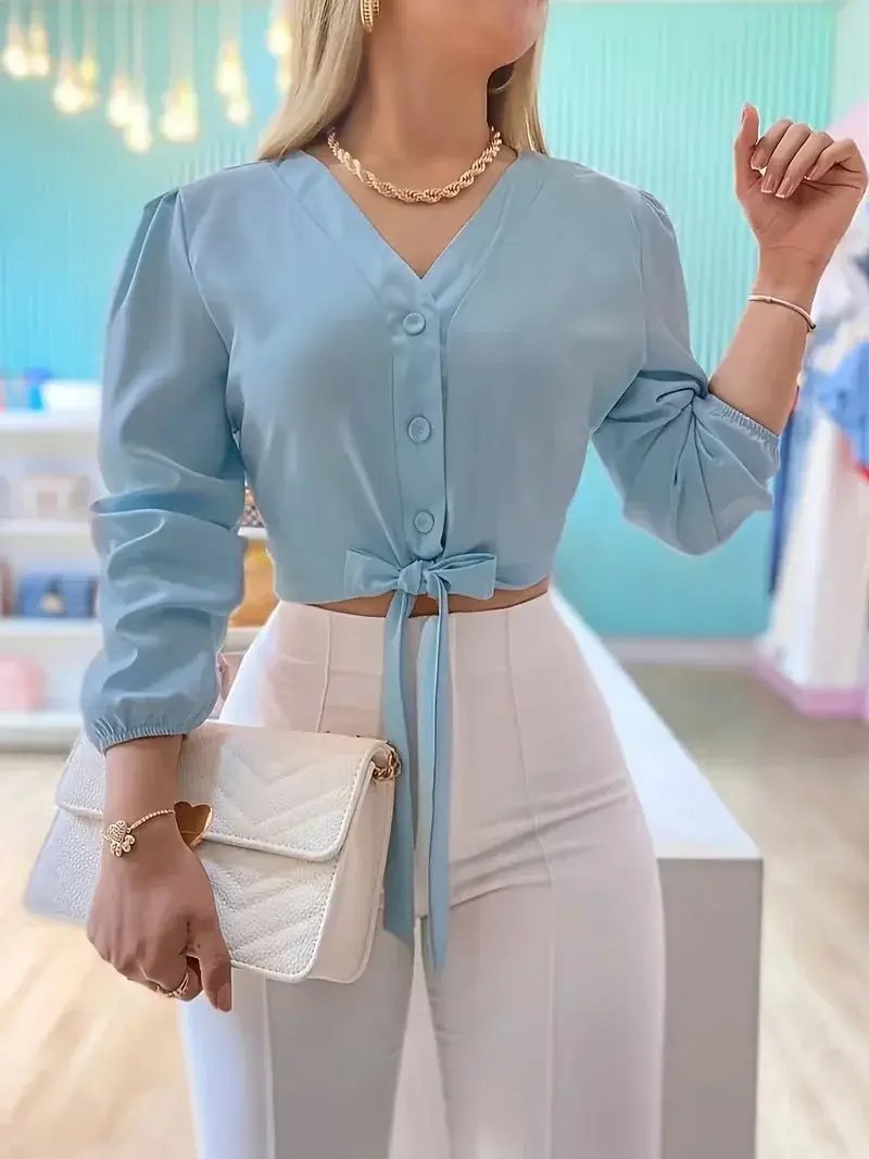 Luxury lace-up cropped top showcasing exquisite design and elegant details perfect for upscale fashion lovers.