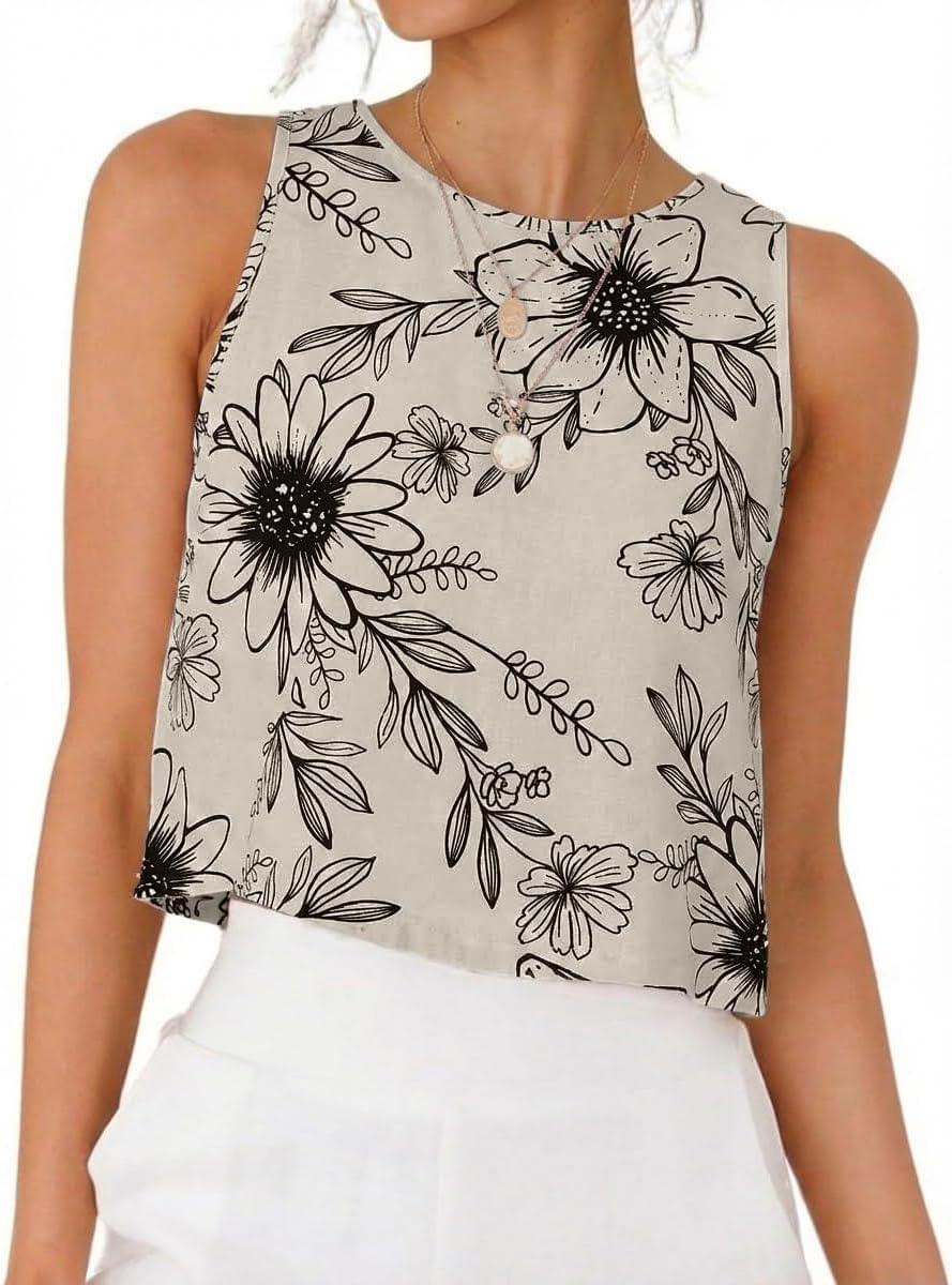 Women's sleeveless floral print top with black and white bloom pattern, paired with white pants for casual summer style.