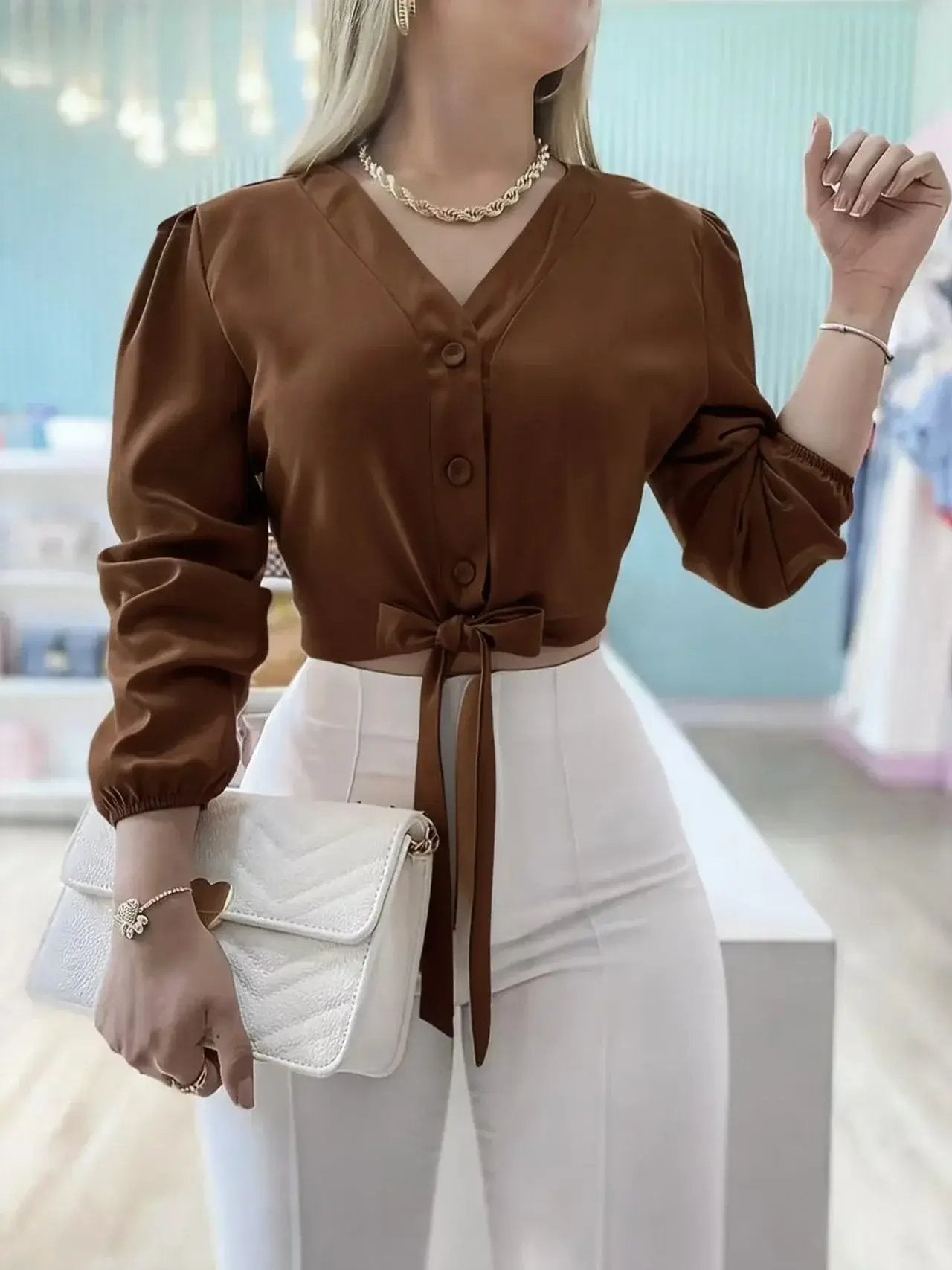 Luxury lace-up cropped top showcasing exquisite design and elegant details perfect for upscale fashion lovers.