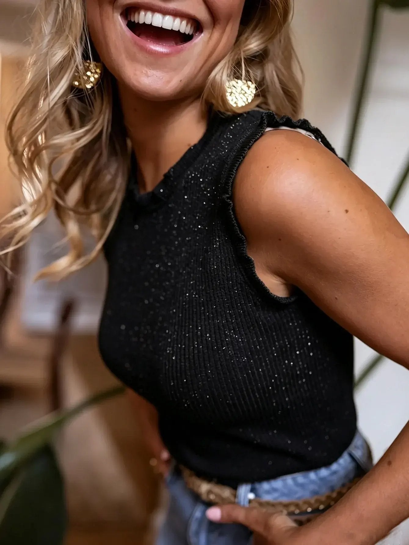 Elegant sleeveless women's ribbed tank top, perfect for chic summer fashion and luxury casual wear.