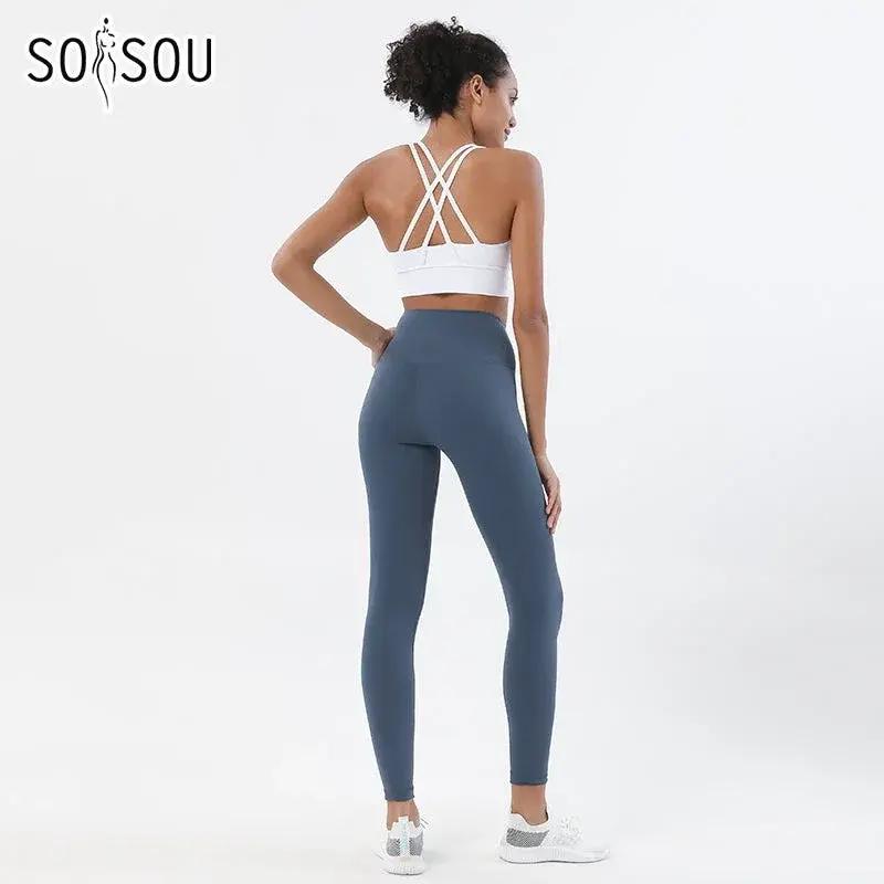 Women's high-waist seamless yoga set by Style Point BD, breathable sports bra and leggings for comfortable gym wear.