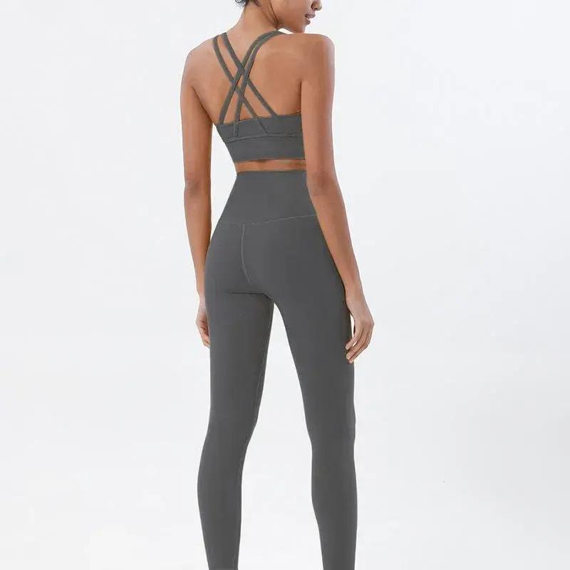 Women's high-waist seamless yoga set with breathable sports bra and leggings, Style Point BD gym wear for active fitness.