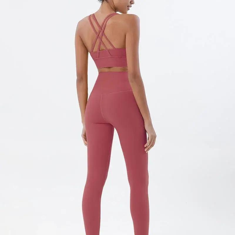 Women’s high-waist seamless yoga set with breathable sports bra and leggings, perfect for active gym wear from Style Point BD.