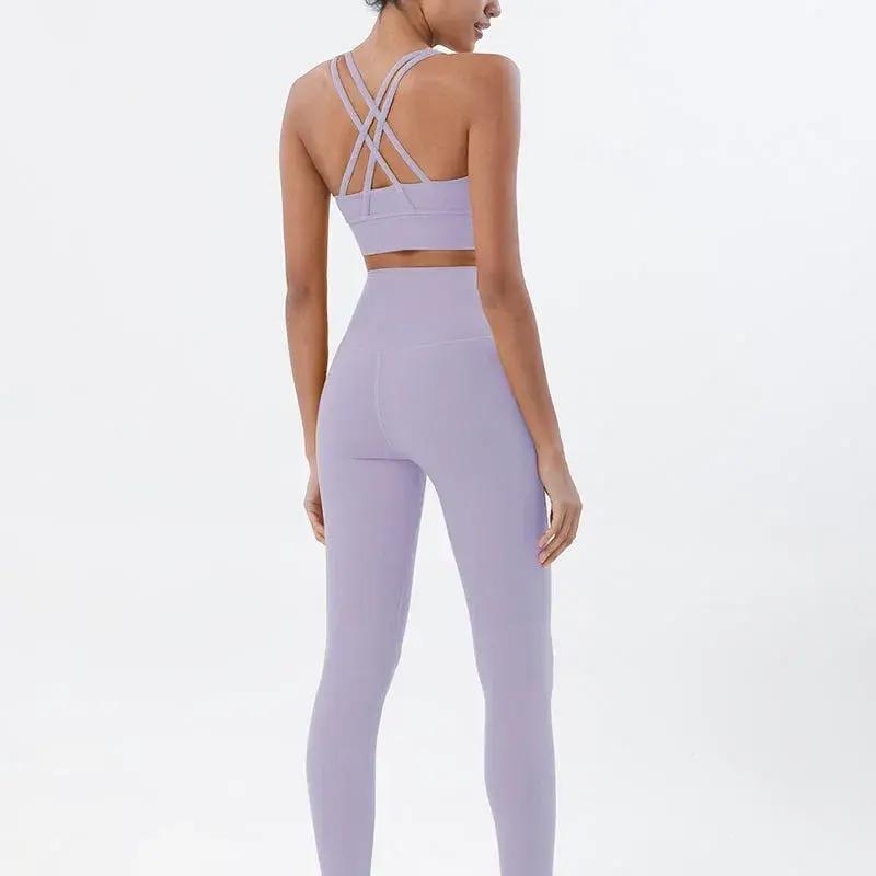 Women's high-waist seamless yoga set with breathable sports bra and leggings by Style Point BD, ideal for active gym wear.