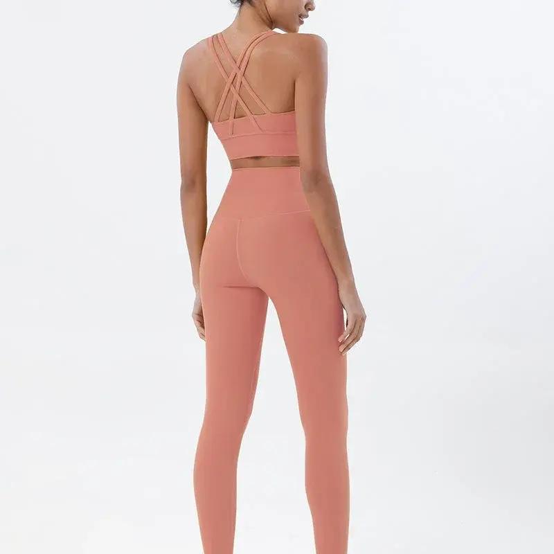 Women's high-waist seamless yoga set with breathable sports bra and leggings from Style Point BD, ideal for active gym wear.