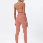 Women's high-waist seamless yoga set with breathable sports bra and leggings from Style Point BD, ideal for active gym wear.