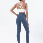 Women's high-waist seamless yoga set with breathable sports bra and leggings in black, from Style Point BD for active wear.