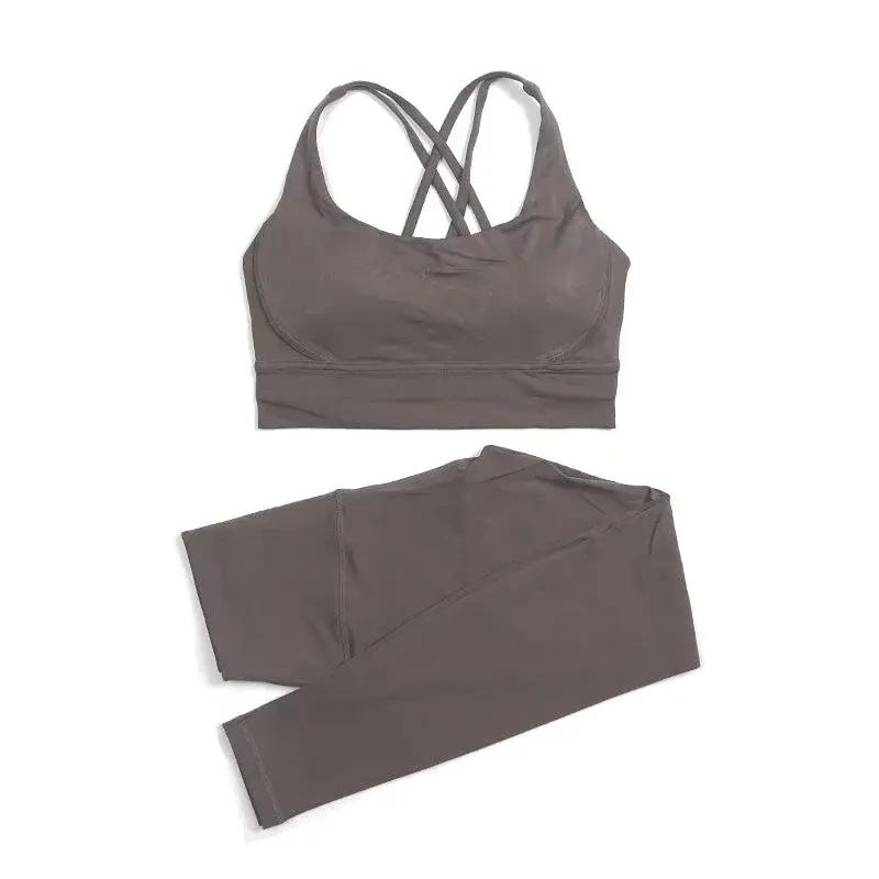 Women's high-waist seamless yoga set with breathable sports bra and leggings by Style Point BD, ideal for active gym wear.