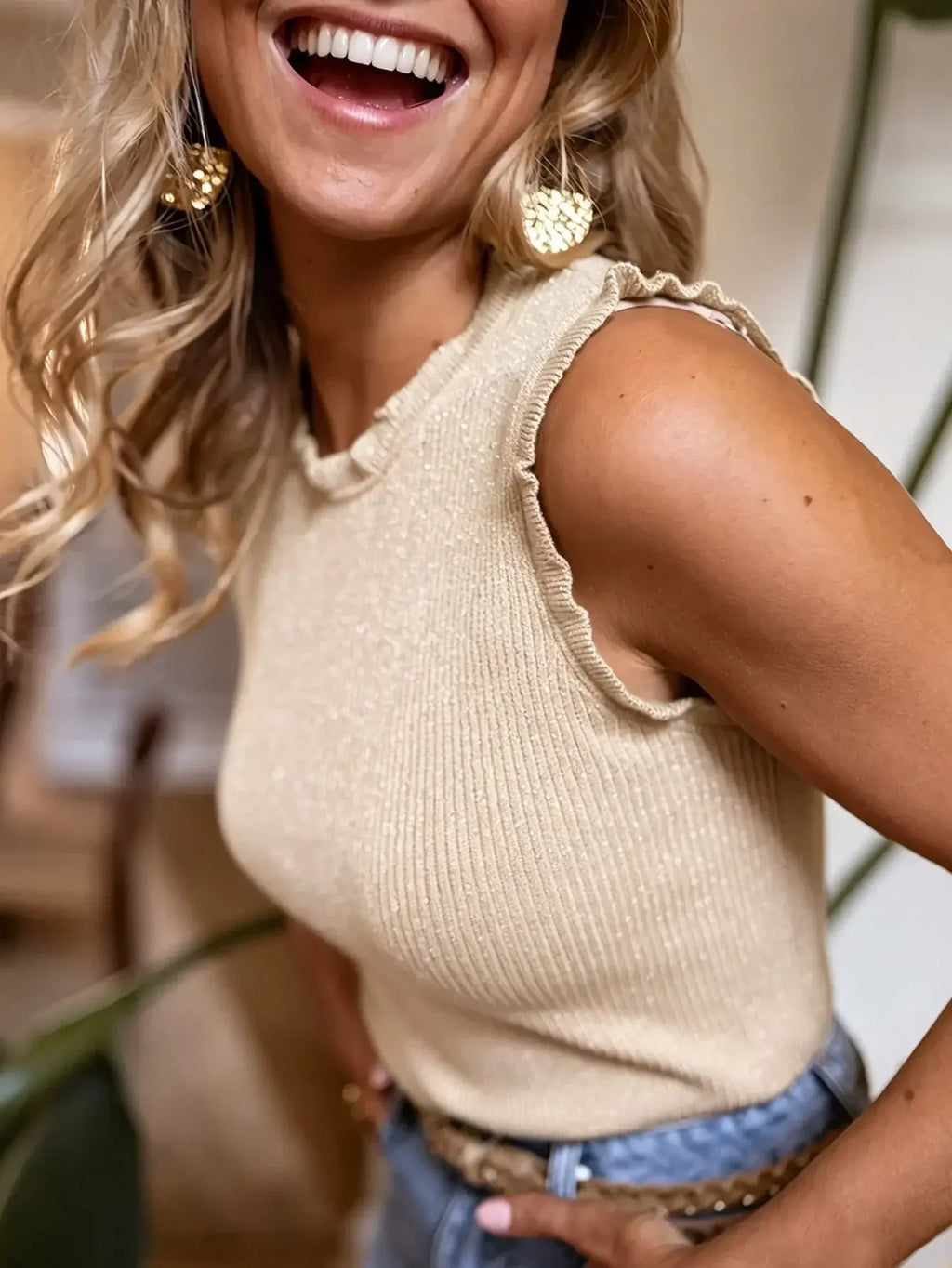 Elegant sleeveless women's ribbed tank top, perfect for chic summer fashion and luxury casual wear.