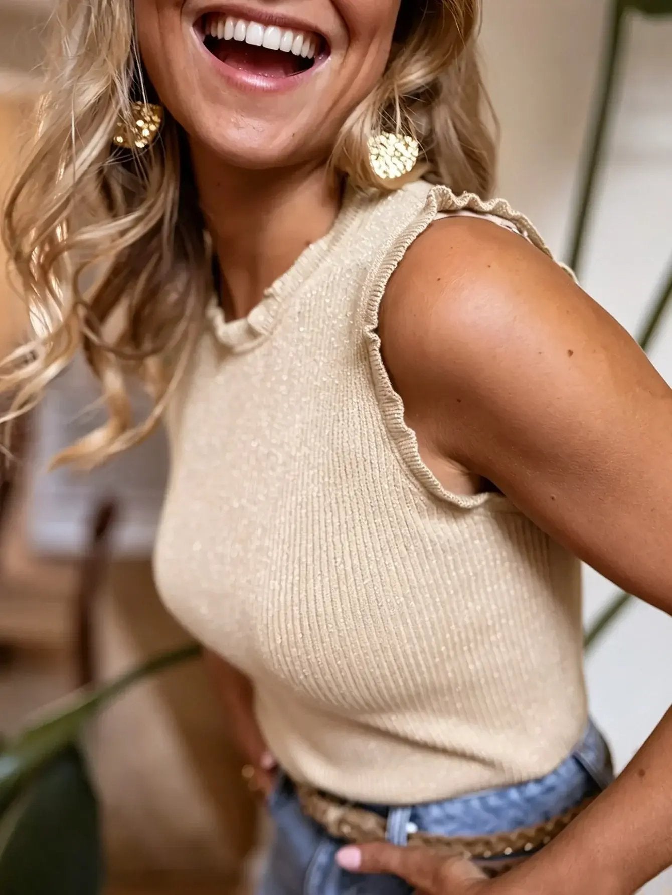 Elegant sleeveless women's ribbed tank top, perfect for chic summer fashion and luxury casual wear.